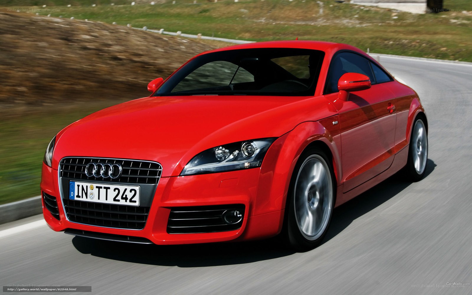 Red Audi TT in motion