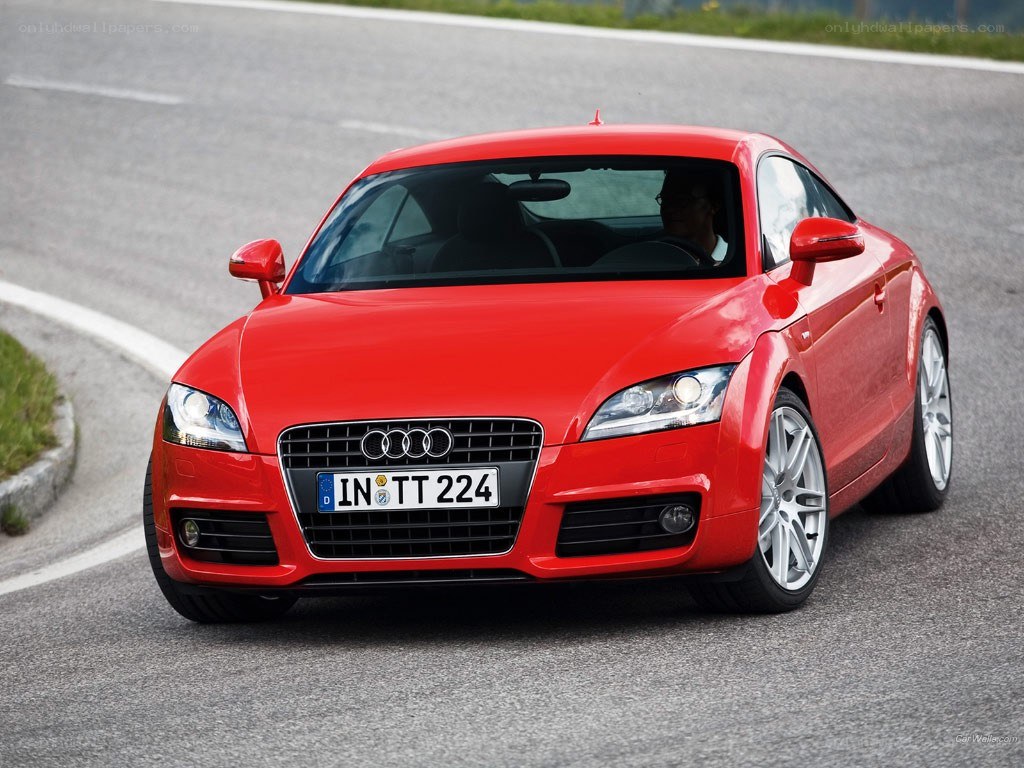 Red Audi TT on a road
