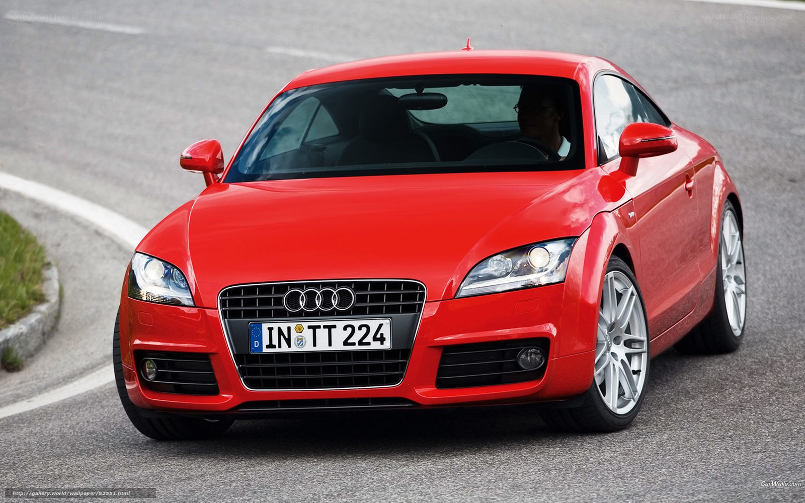 Red Audi TT on a road