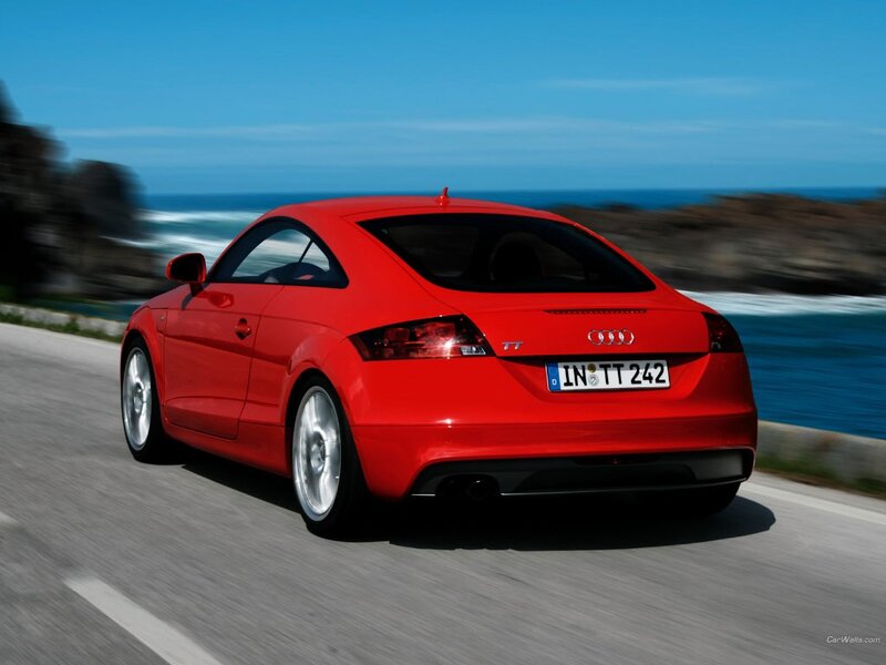 red audi tt on coastal road