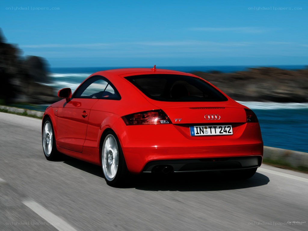 red audi tt on coastal road