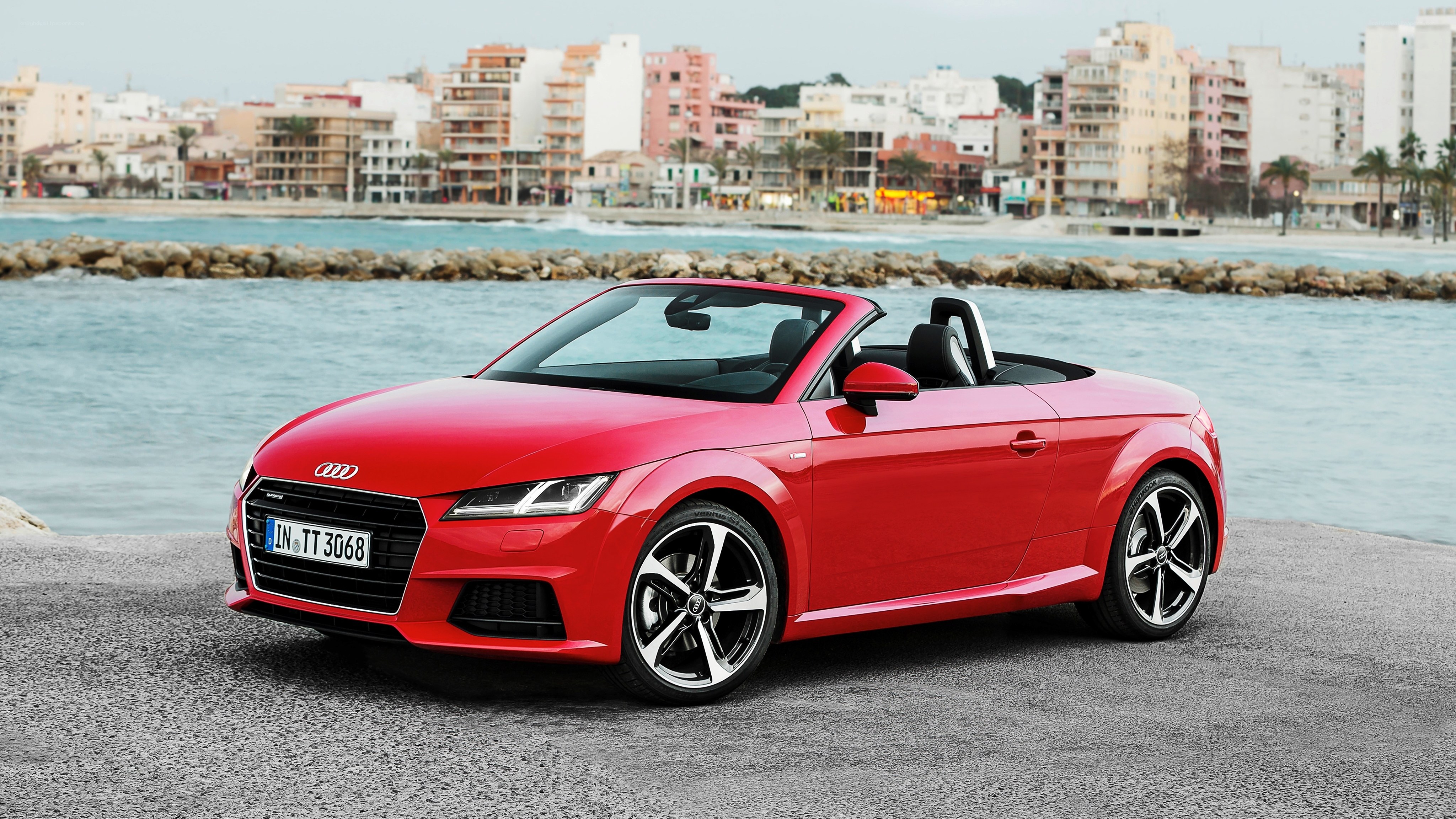 Red Audi TT Roadster by the sea