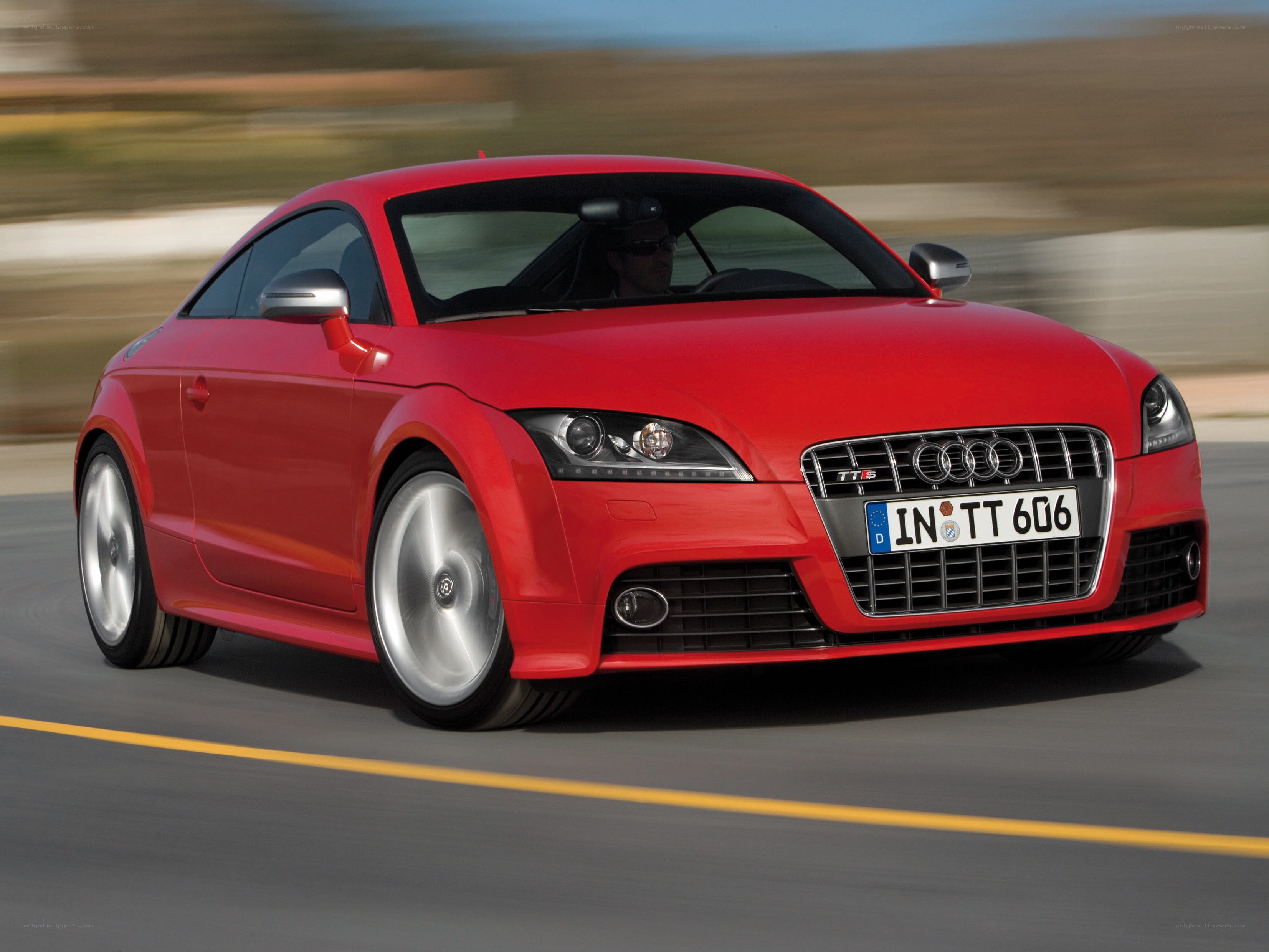 Red Audi TT RS in motion