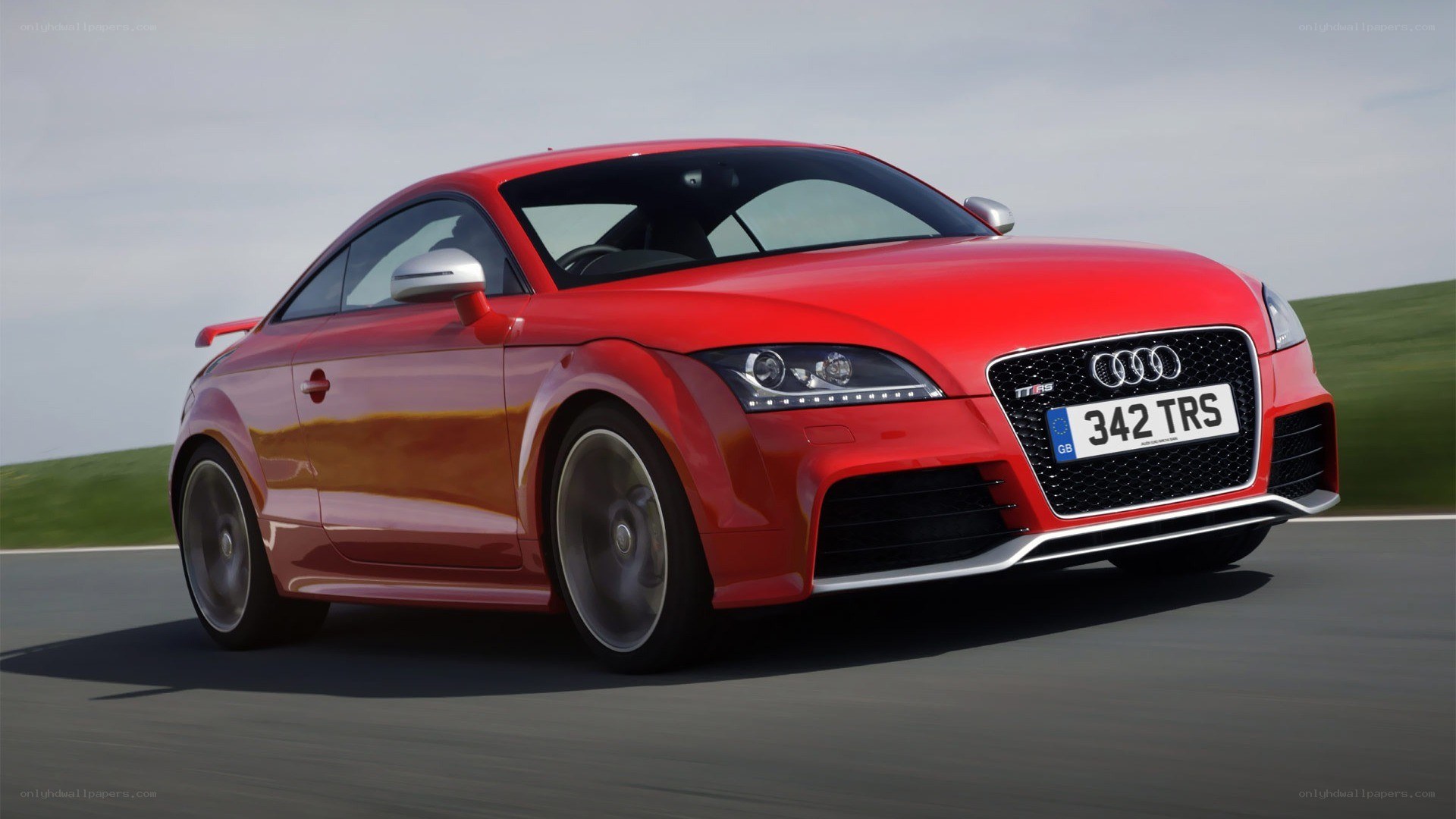 Red Audi TT RS in motion