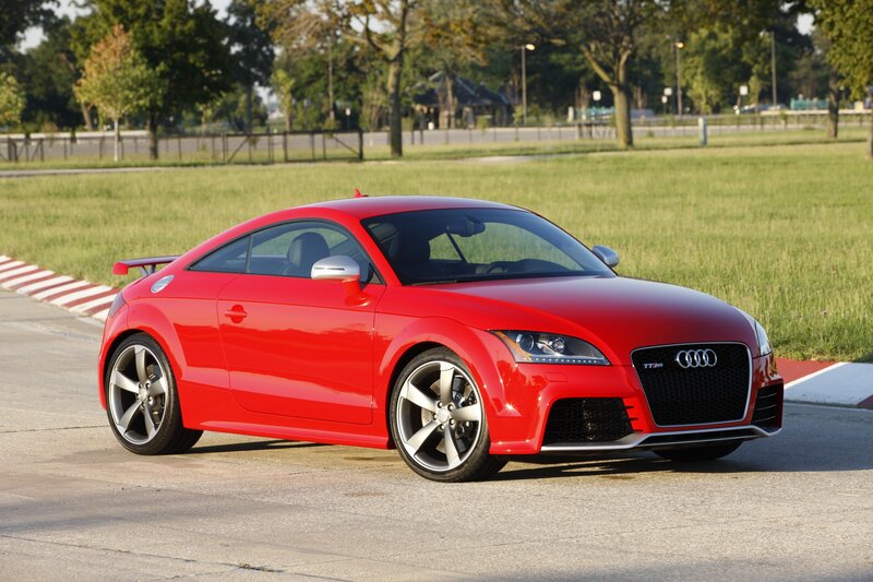 Red Audi TT RS on a racetrack
