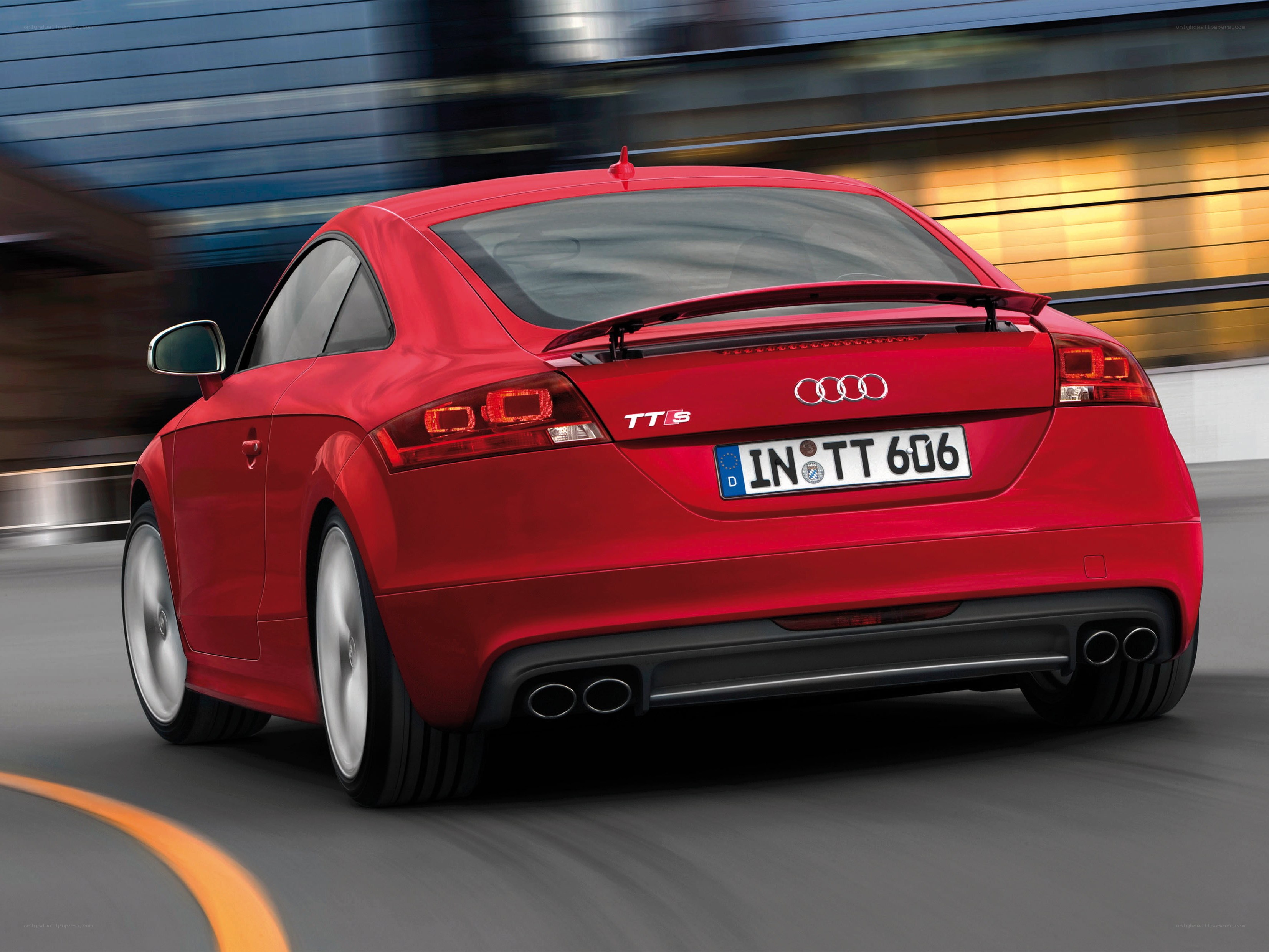 Red Audi TT S in motion