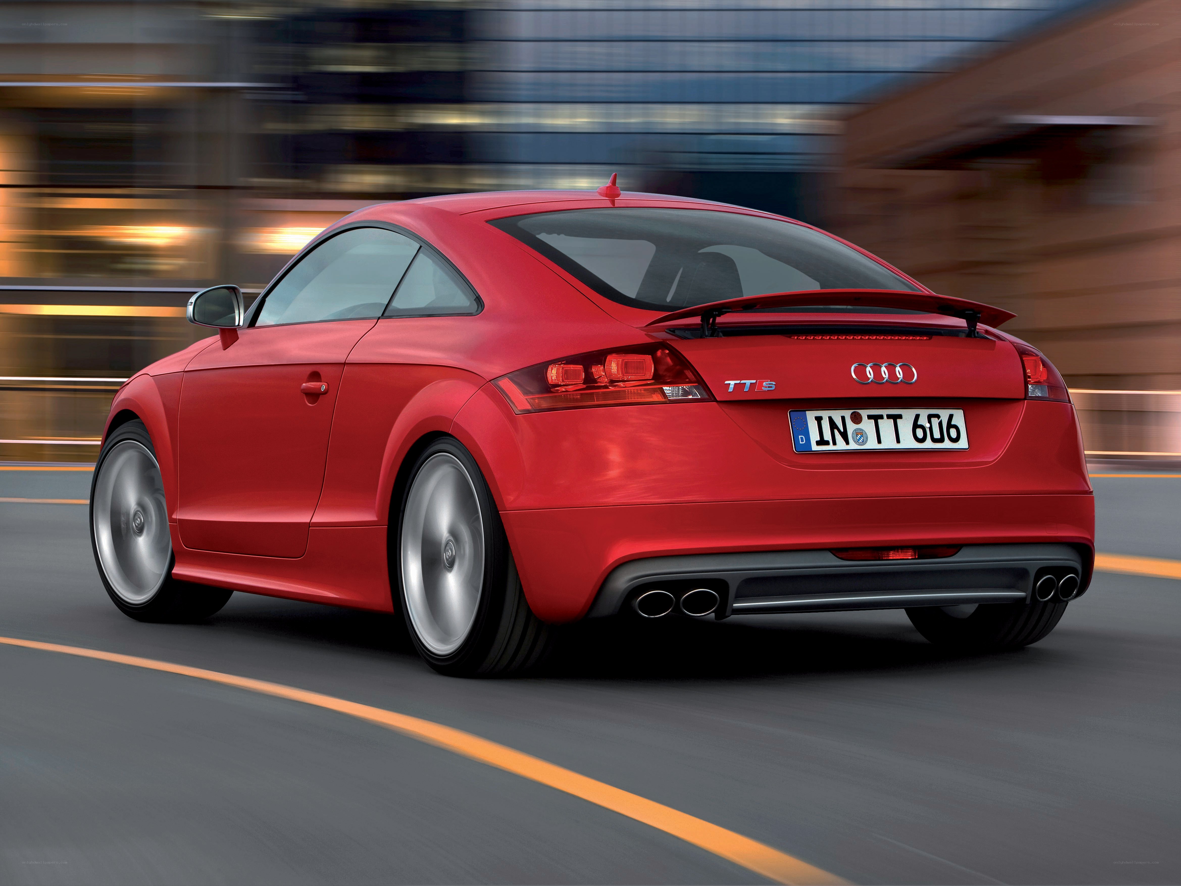 Red Audi TT S in motion