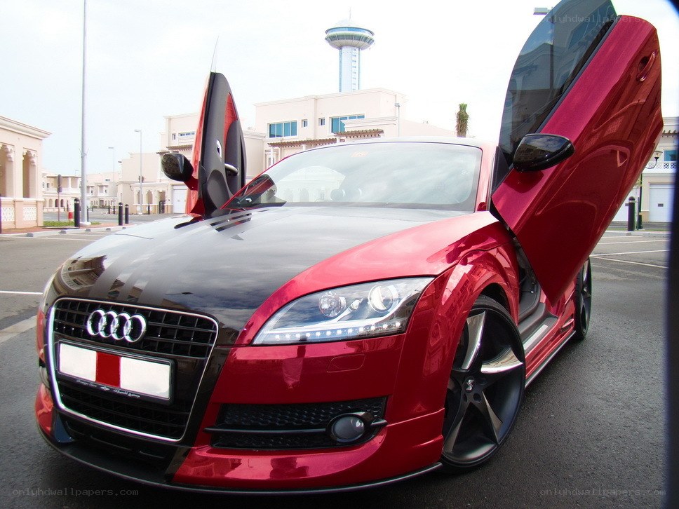 Red Audi TT with doors open