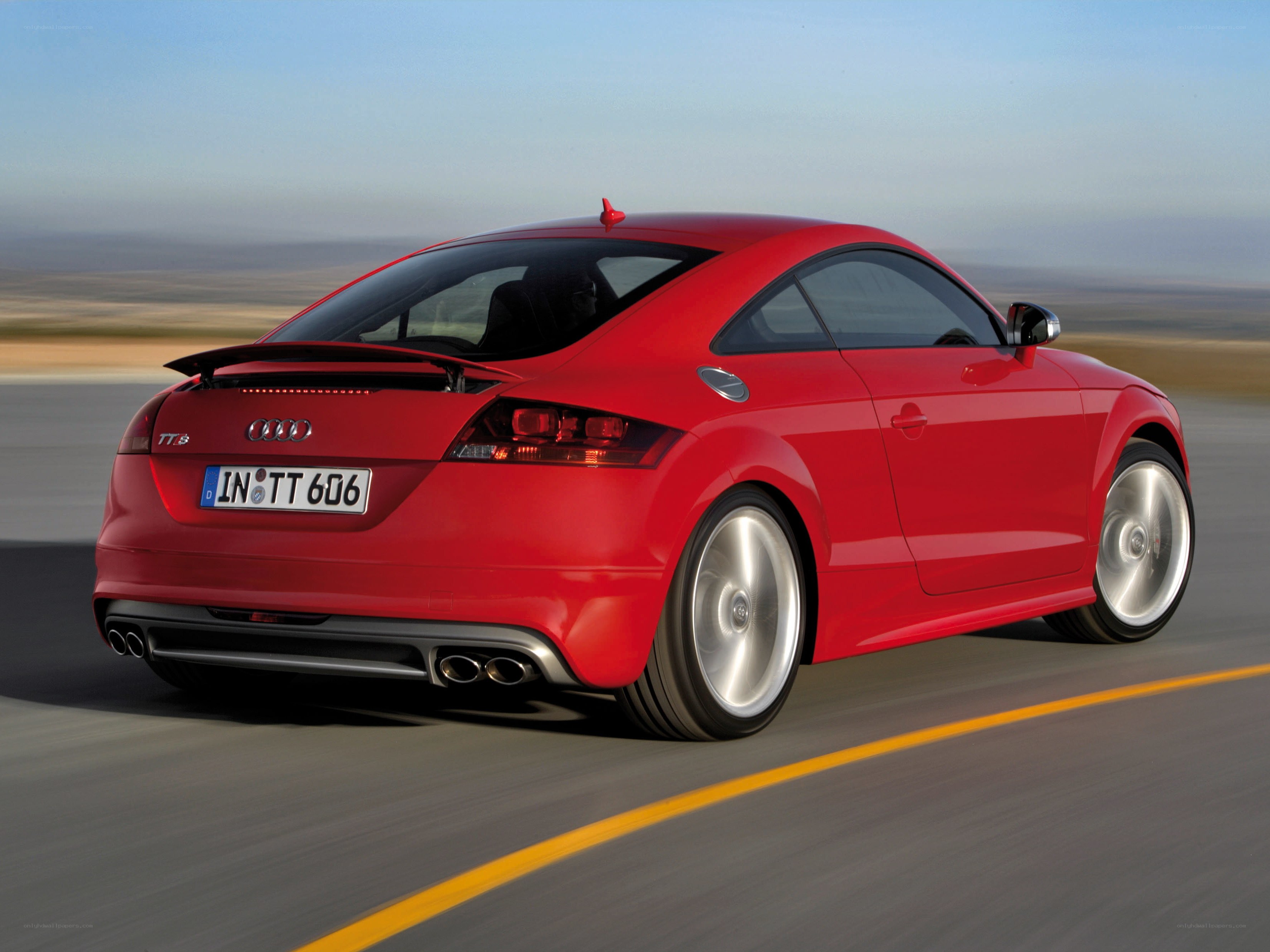 Red Audi TT8 in motion