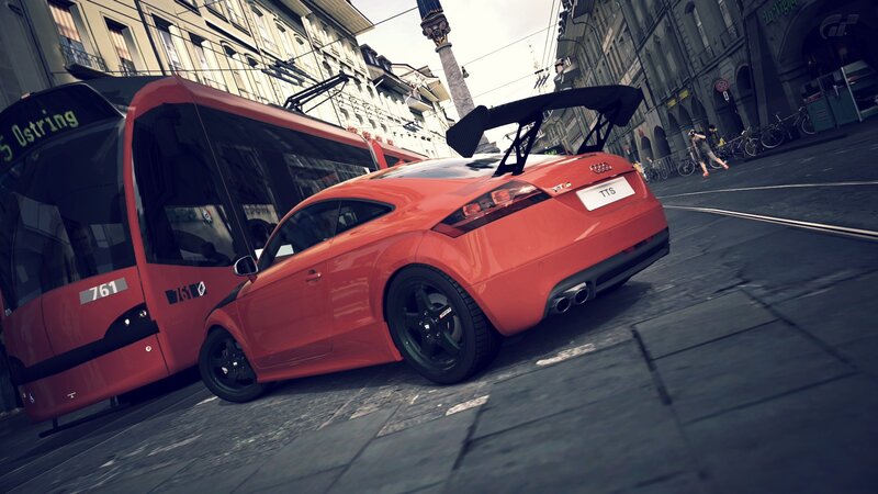 Red Audi TTS on city street