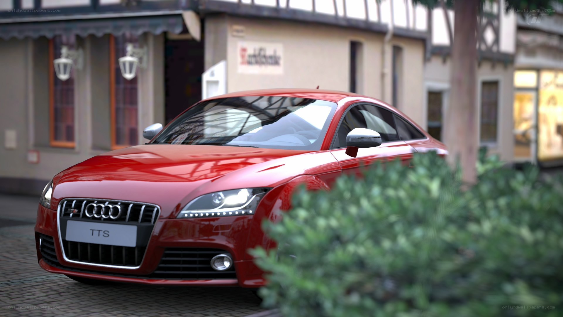 Red Audi TTS parked on street