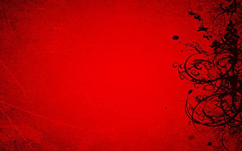 red background with black floral design