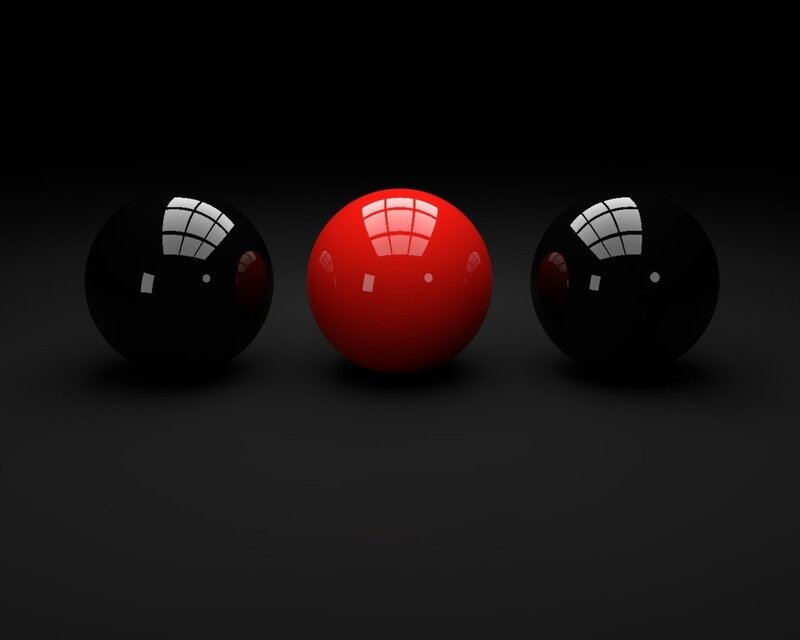 Red ball between two black balls