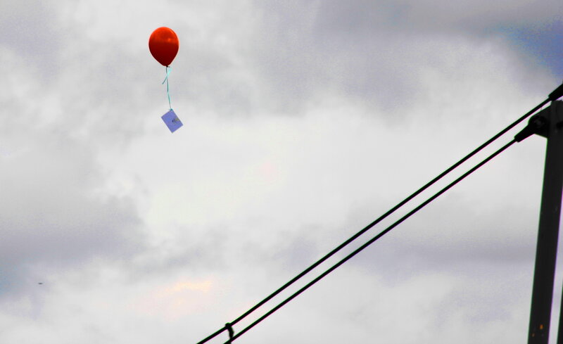 Red Balloon Floating