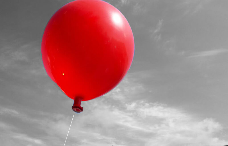 Red Balloon in Sky