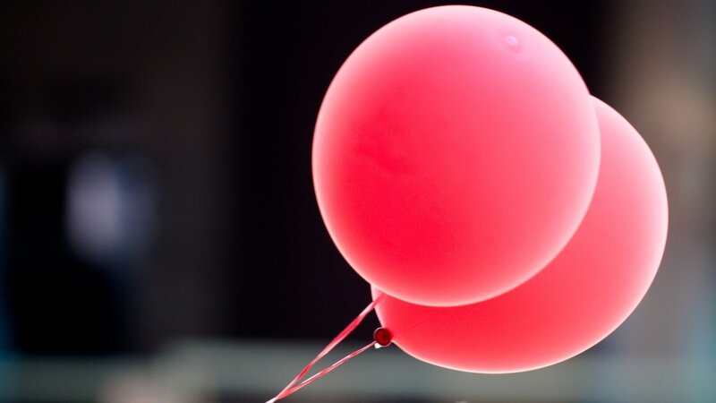 Red balloons floating