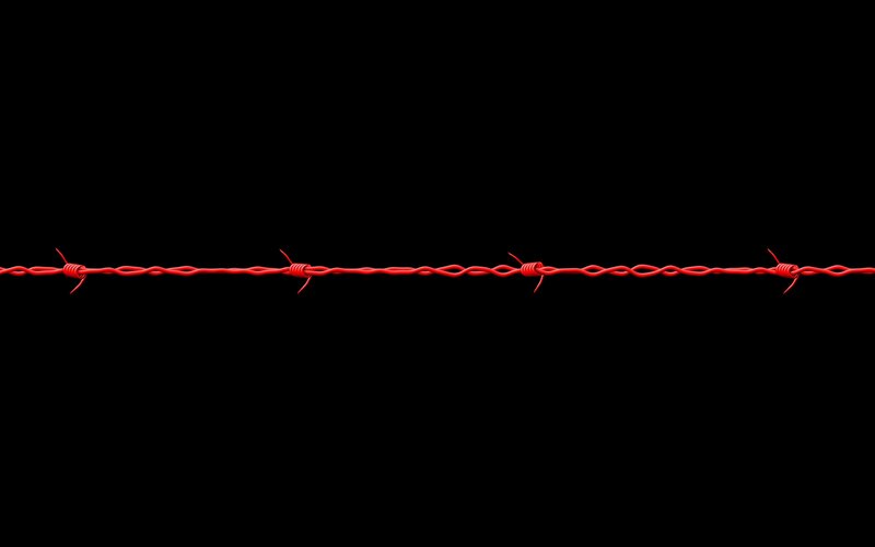 red barbed wire on black