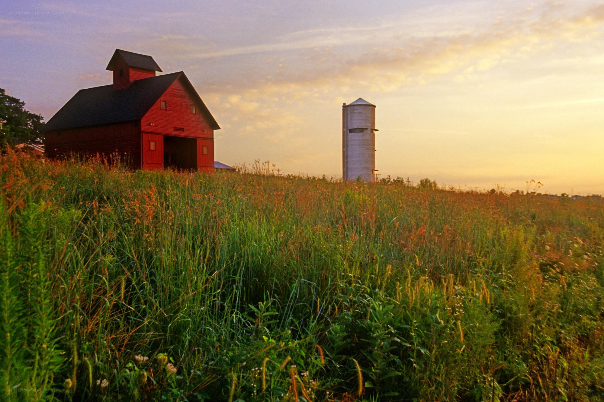 Red barn at sunset