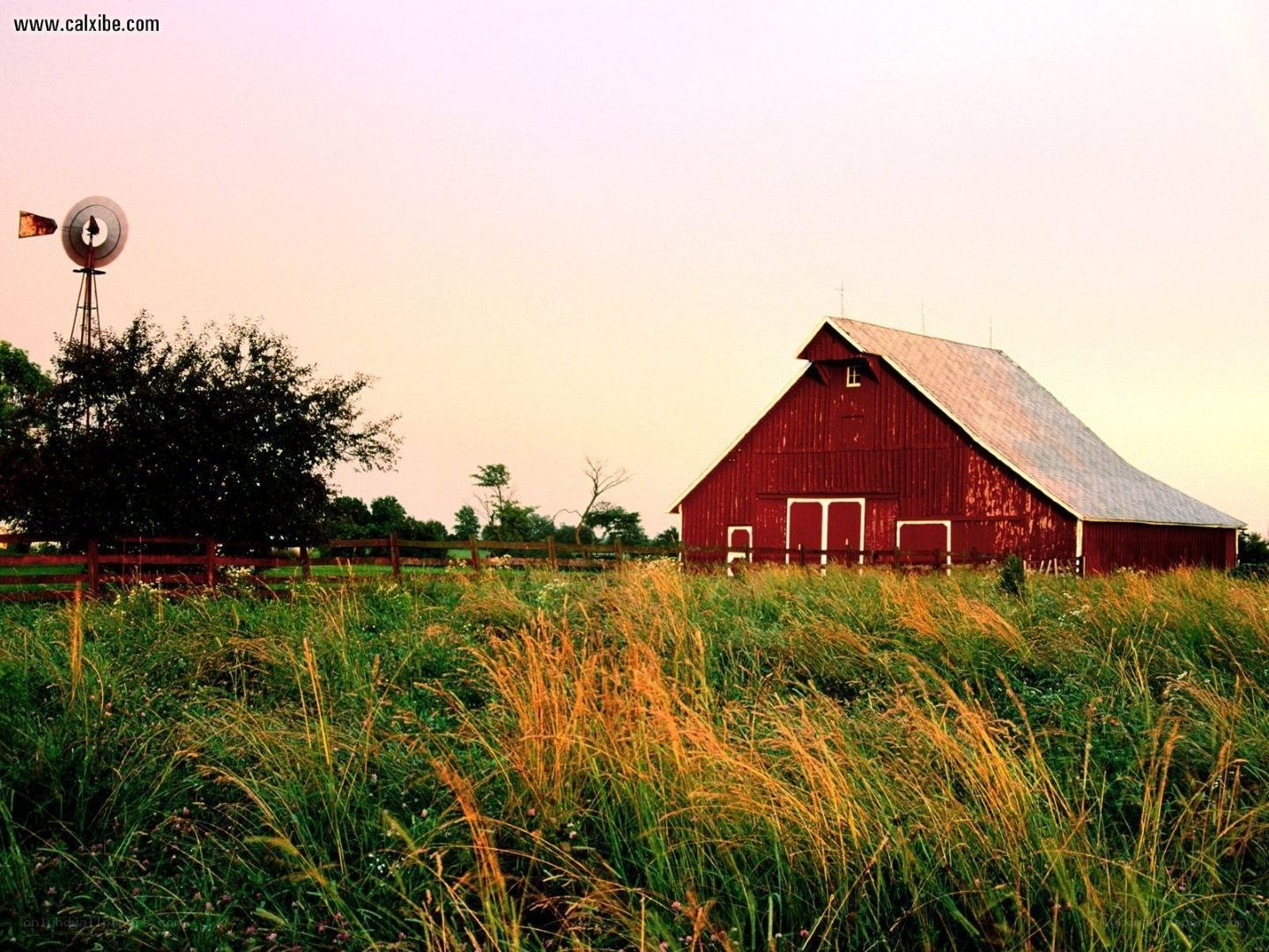 Red barn at sunset
