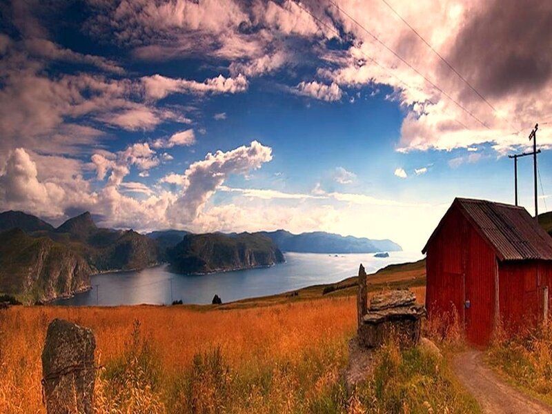 Red barn by the fjord