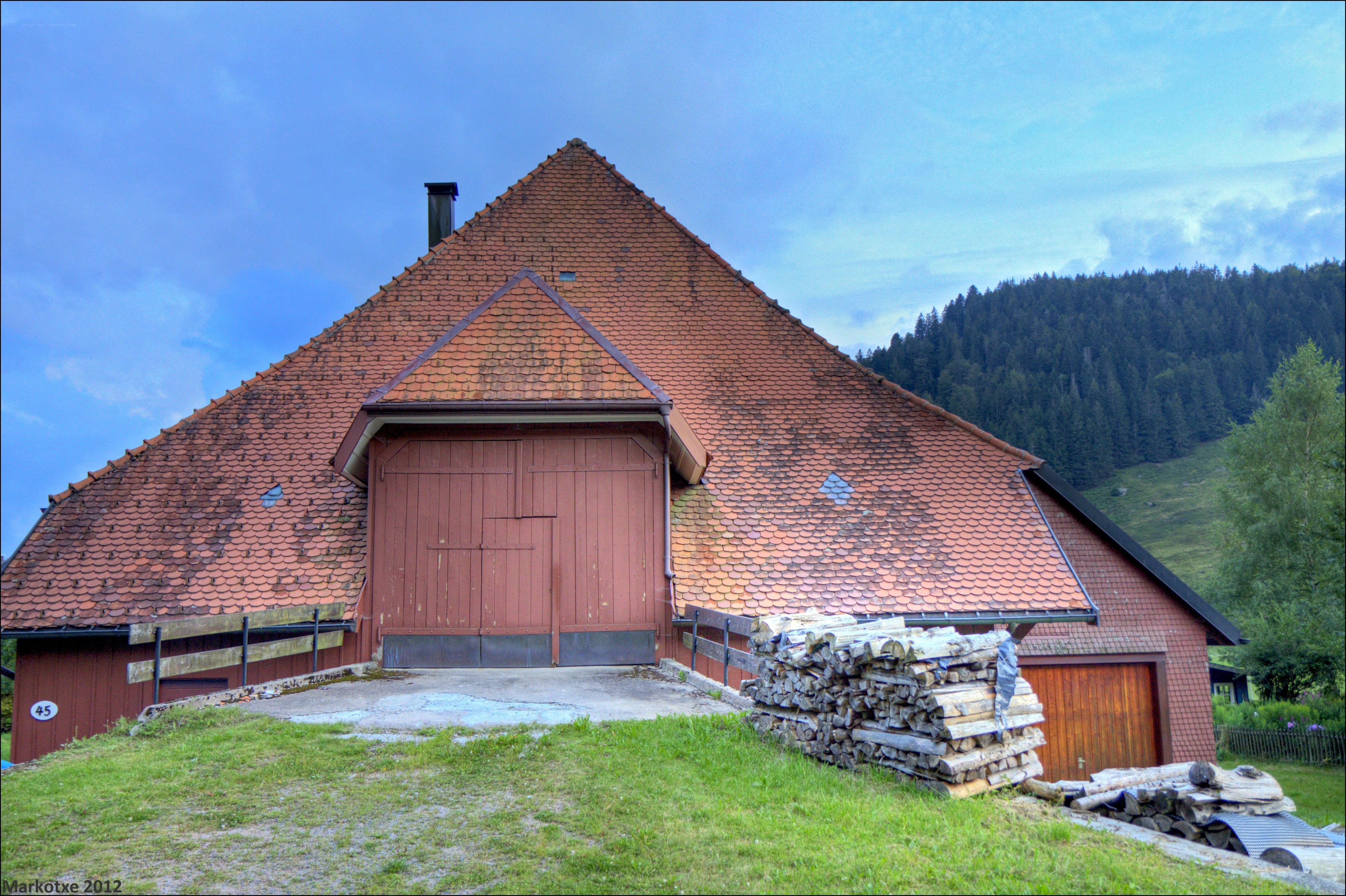 Red barn in a mountain valley