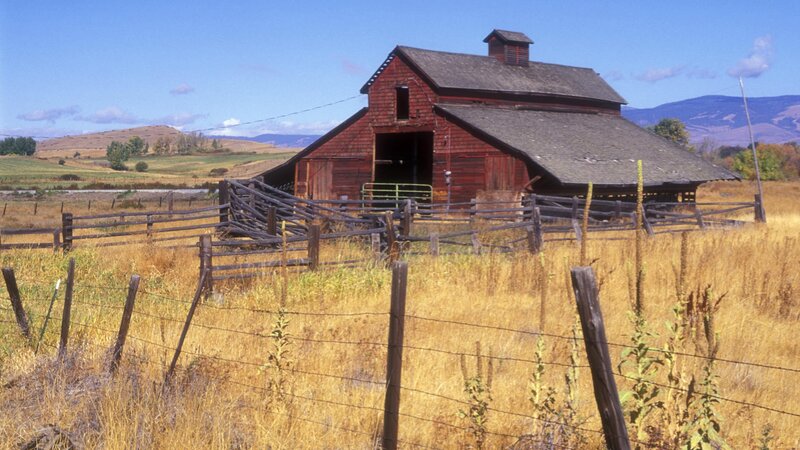 Red barn in rural landscape