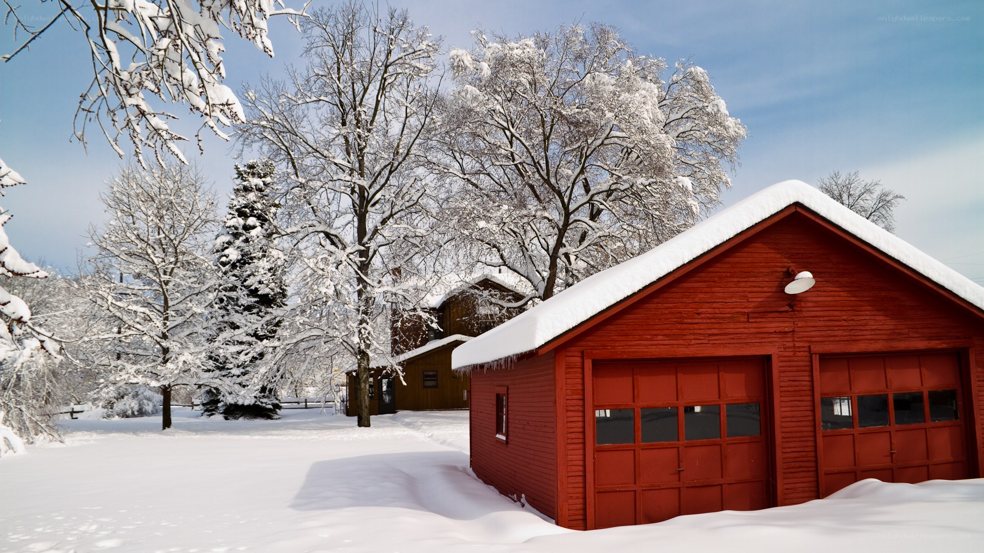 Red barn in snowy landscape