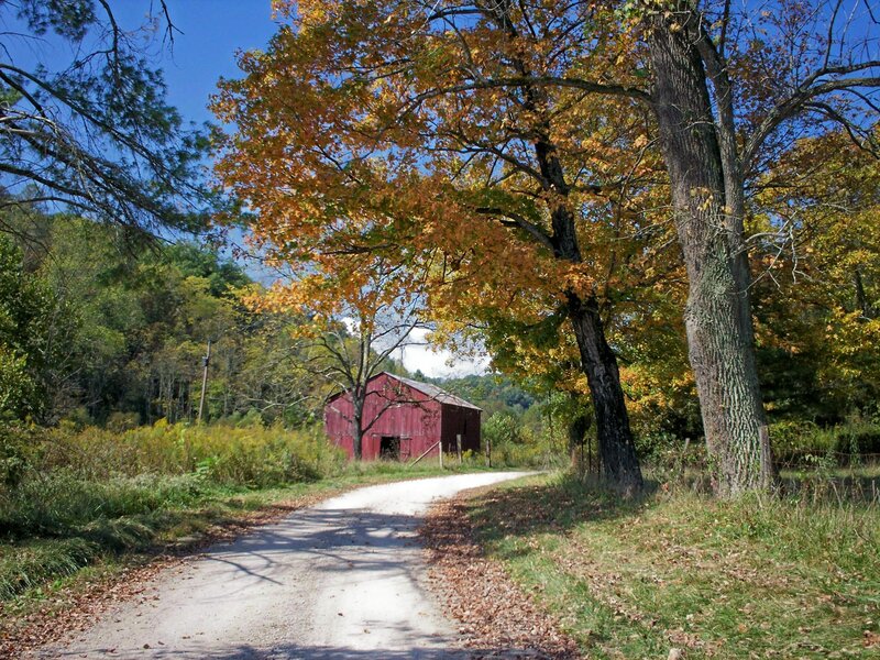 Red barn on a country road