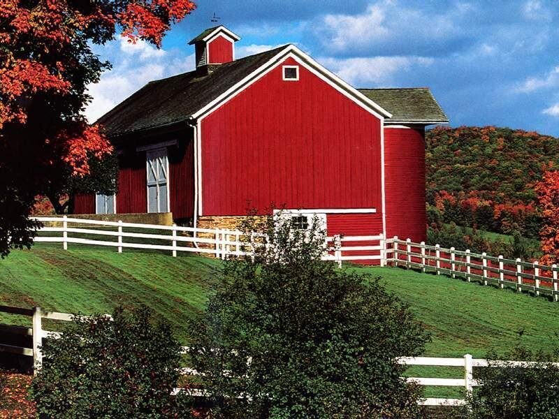 Red barn on a hill