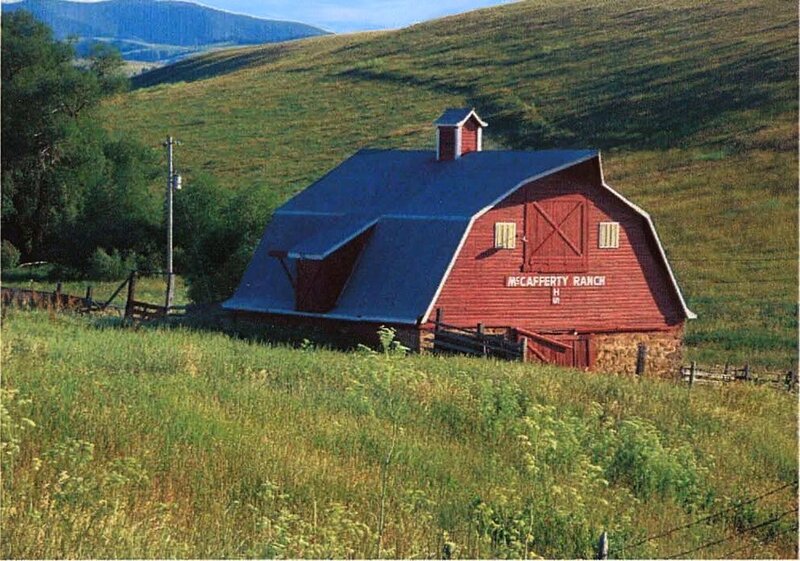 Red barn on a hillside