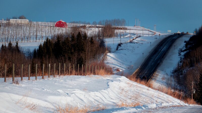 Red Barn on Snowy Hill