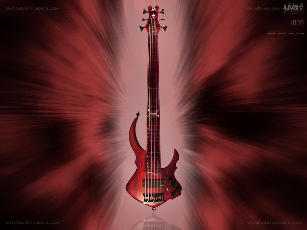 Red bass guitar on red background