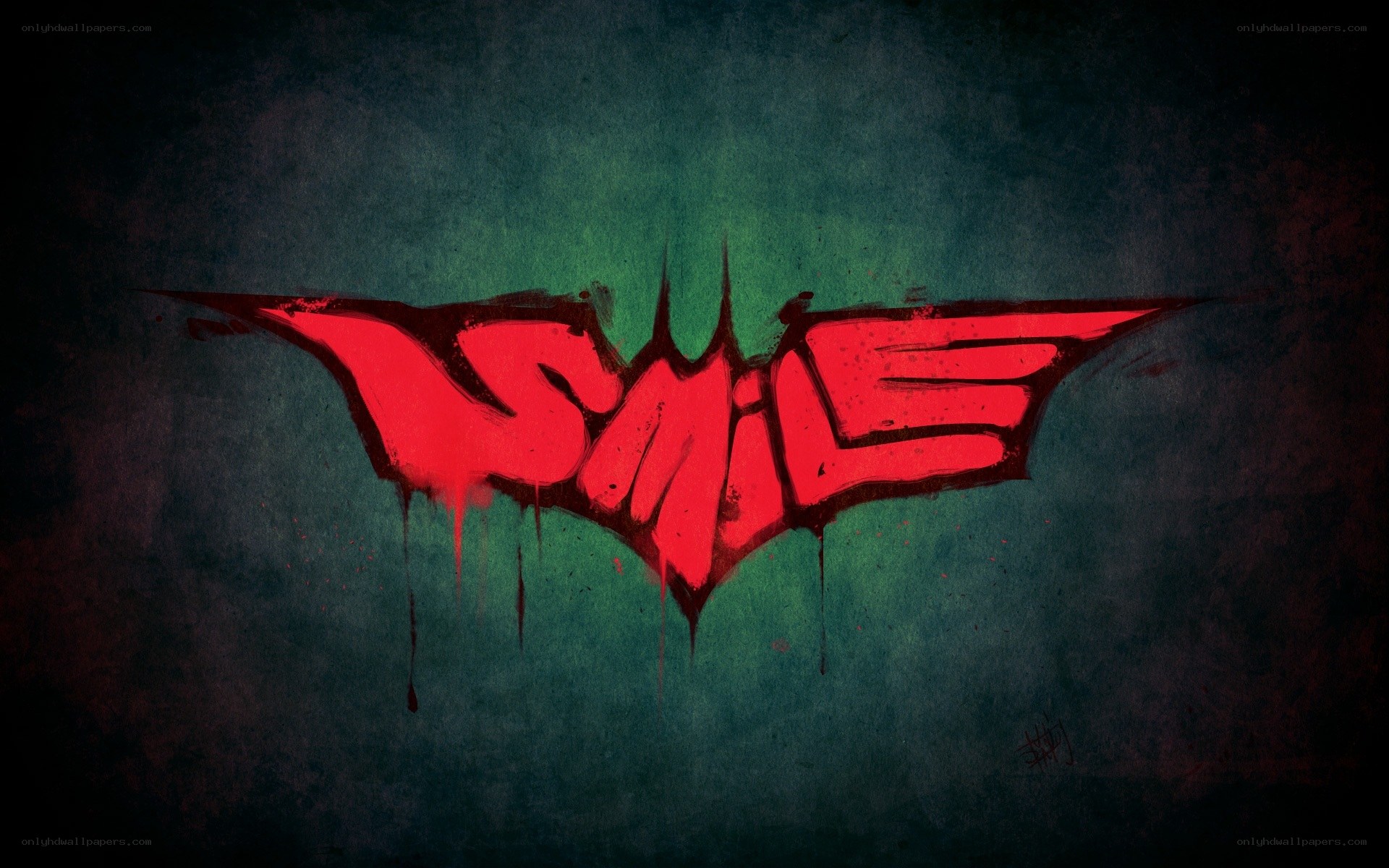 red bat symbol with smile