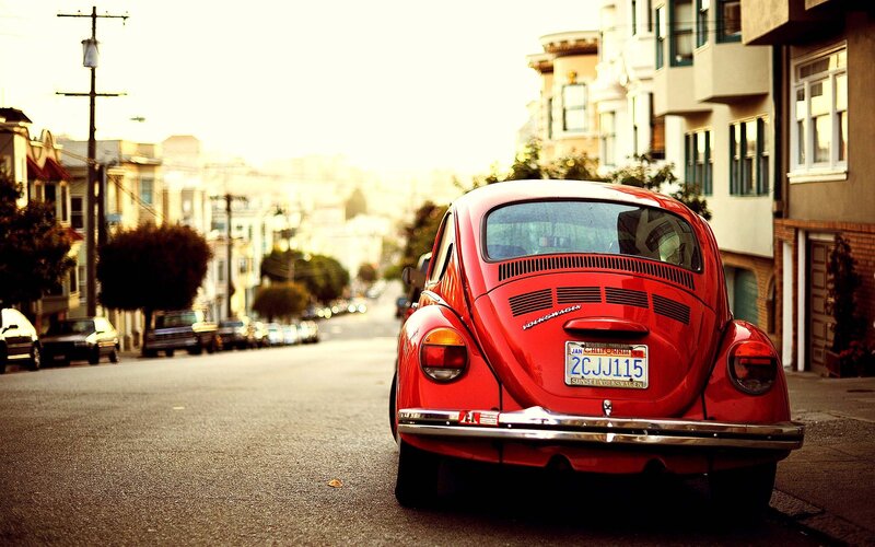 Red Beetle on a city street