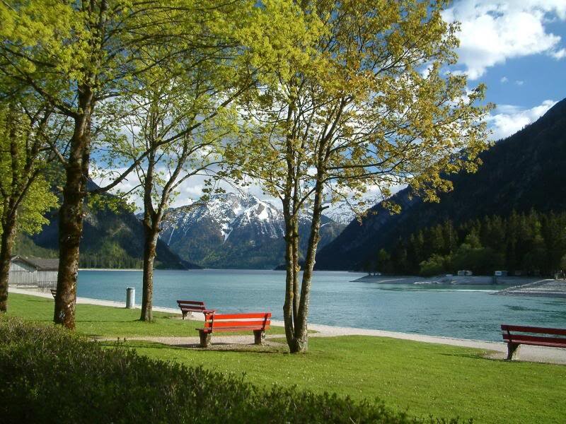 Red Benches by Lake