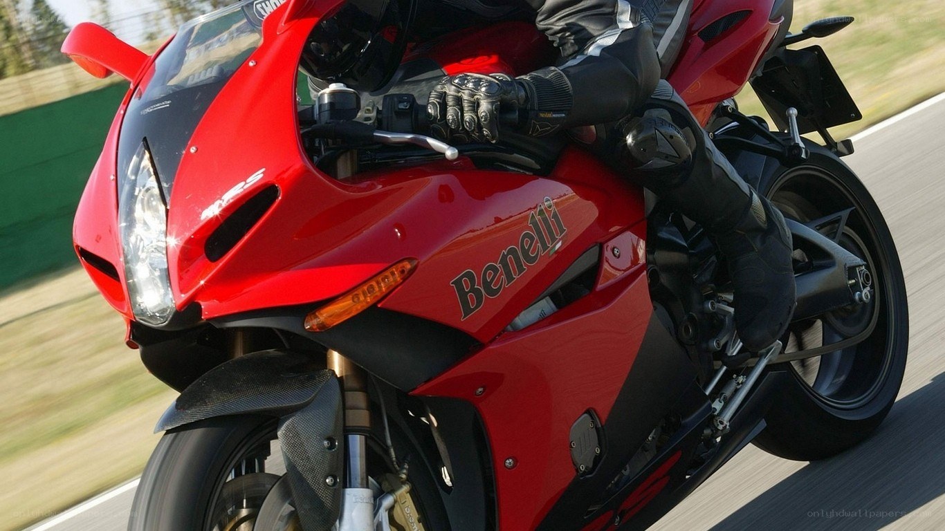 Red Benelli motorcycle in motion