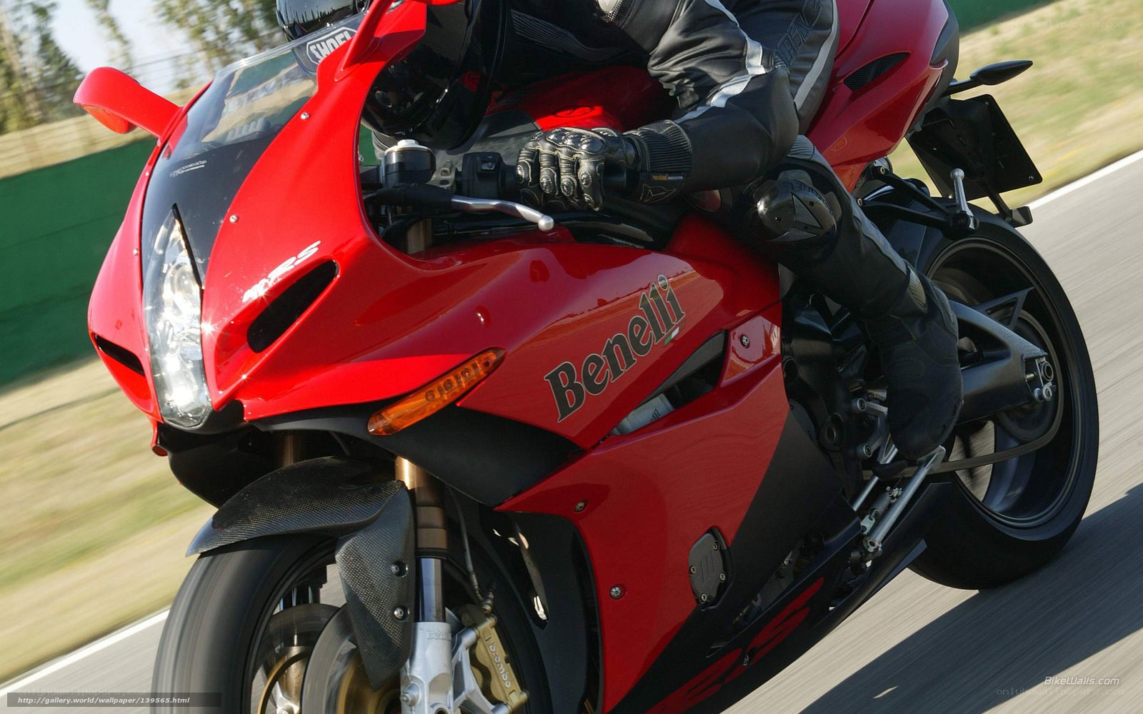 Red Benelli motorcycle in motion
