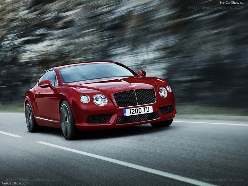 Red Bentley GT in motion
