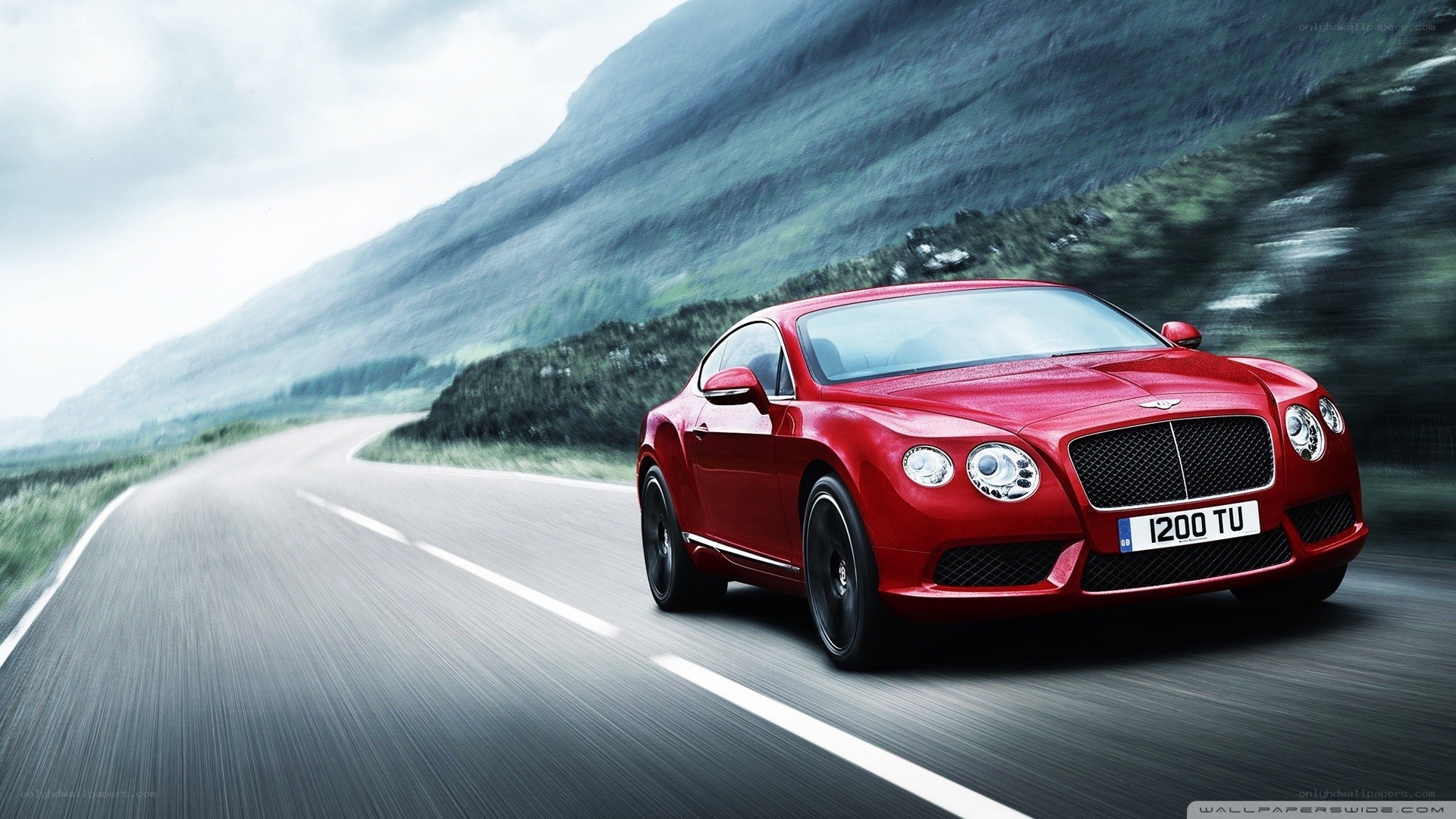 Red Bentley on mountain road