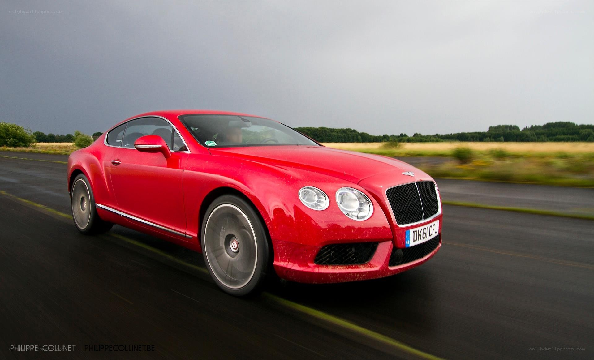Red Bentley speeding on road