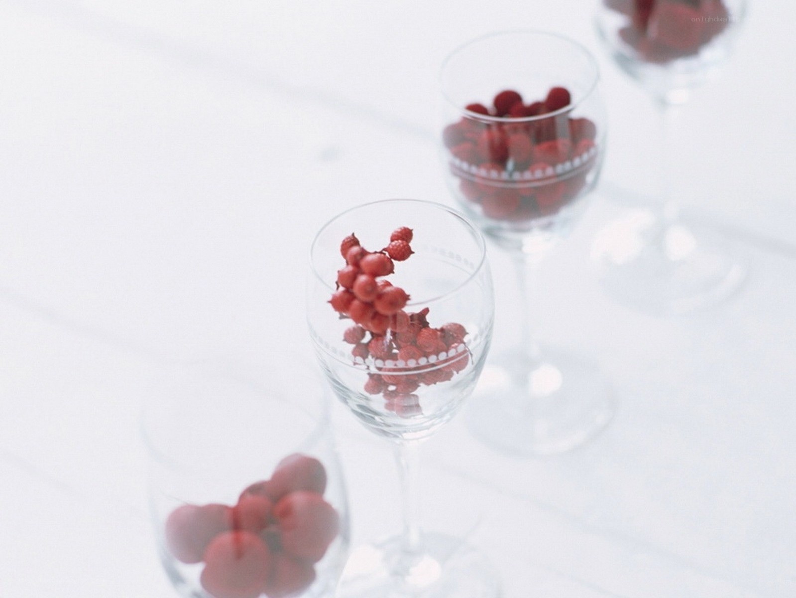 Red berries in glass cups