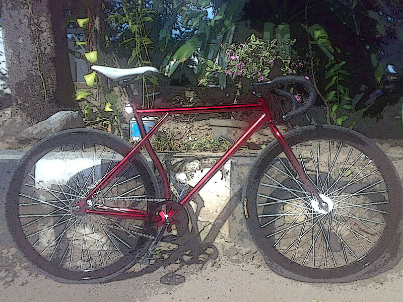 Red Bicycle on Pavement