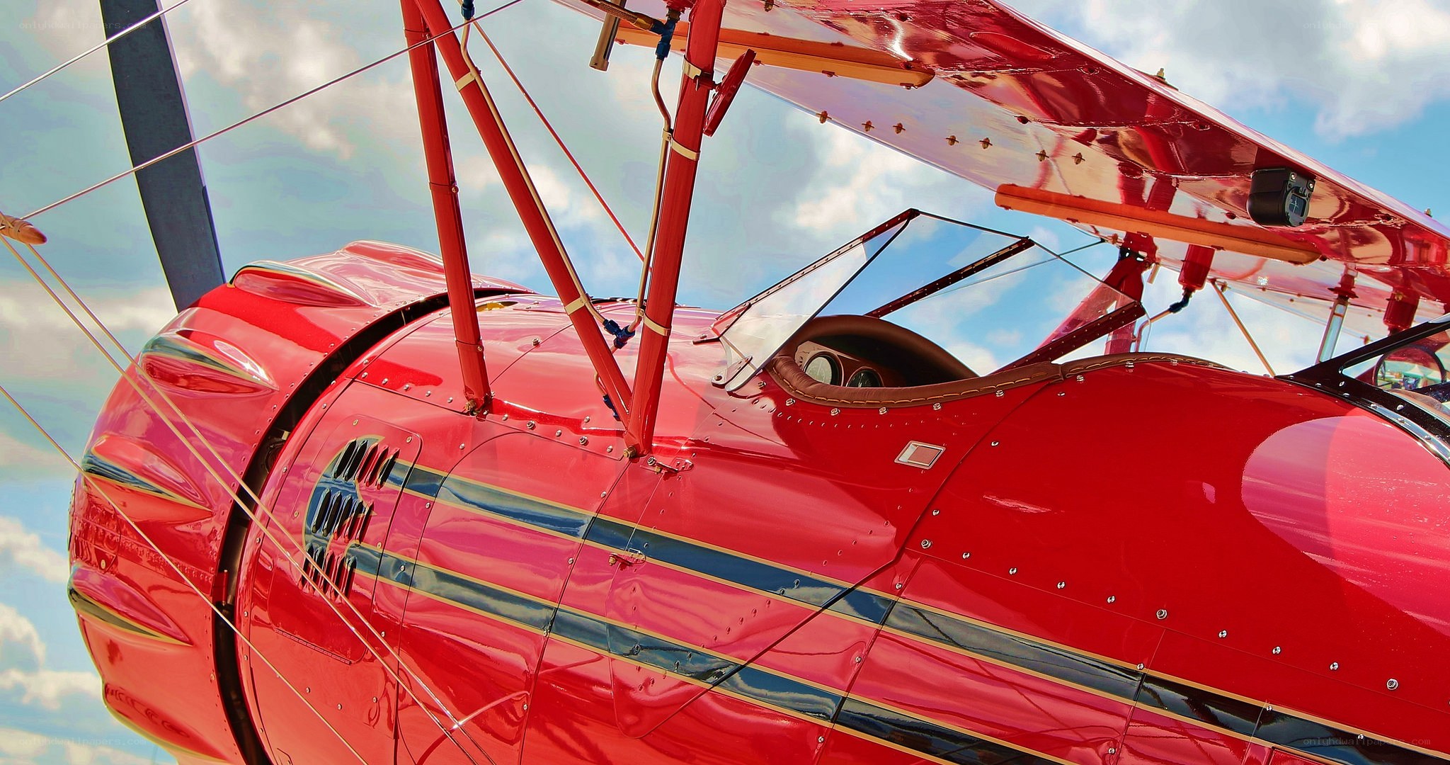 Red biplane aircraft