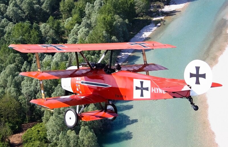 Red Biplane Flying — Dynamic, Afternoon