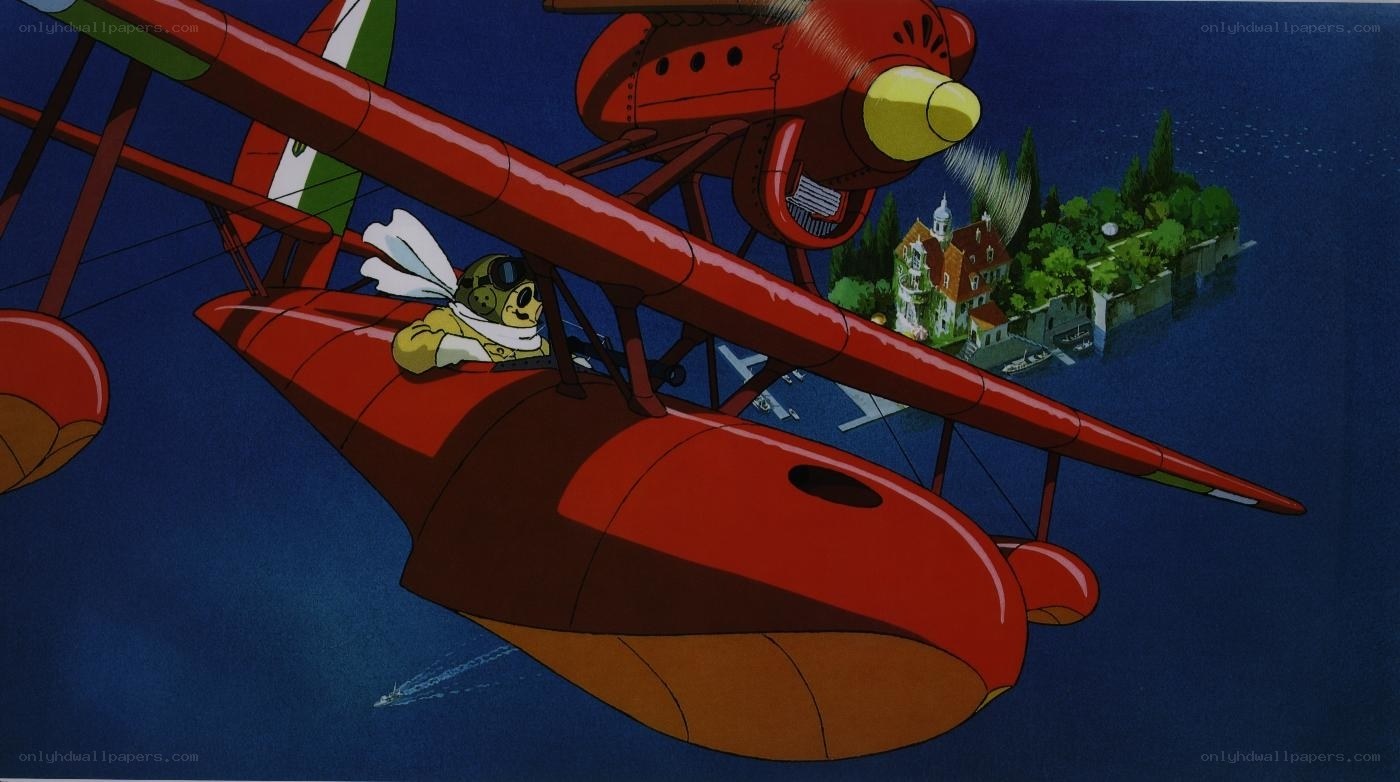 Red biplane flying over island