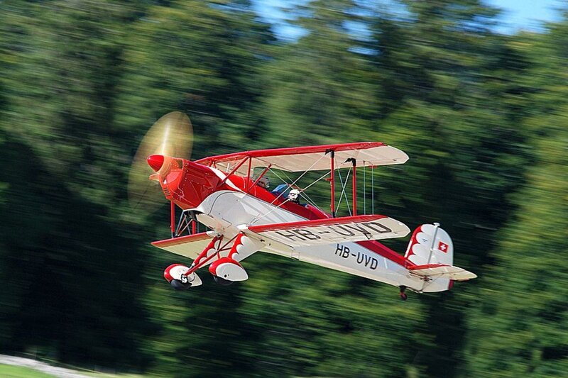 Red Biplane in Flight — Dynamic, Afternoon