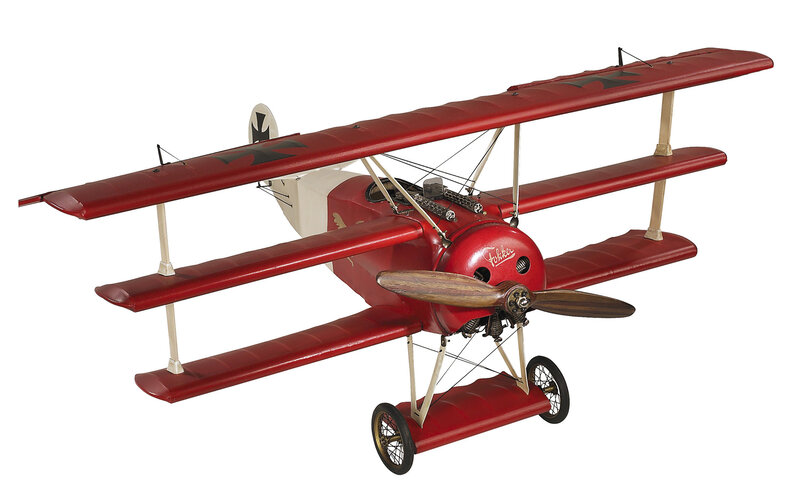 Red biplane model aircraft