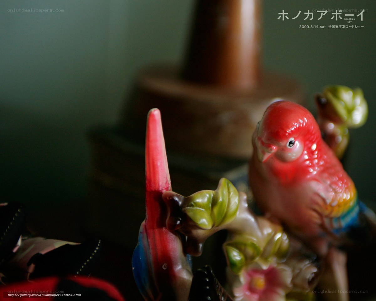 Red bird figurine on display