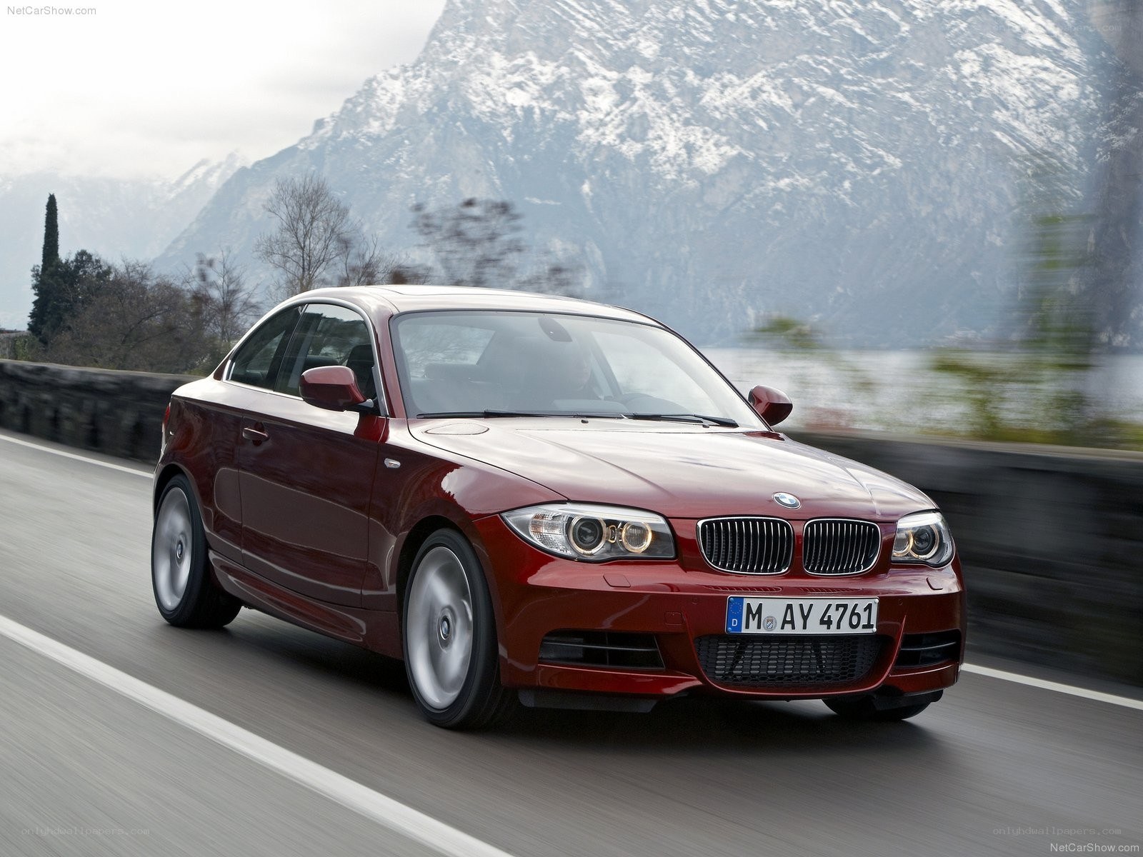 Red BMW 1-Series in motion