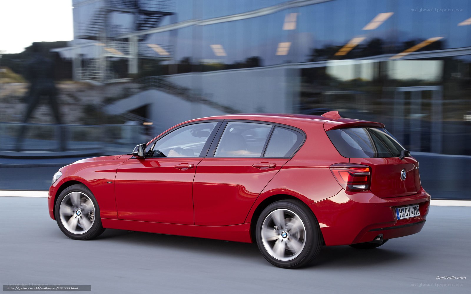 Red BMW 1 Series in motion